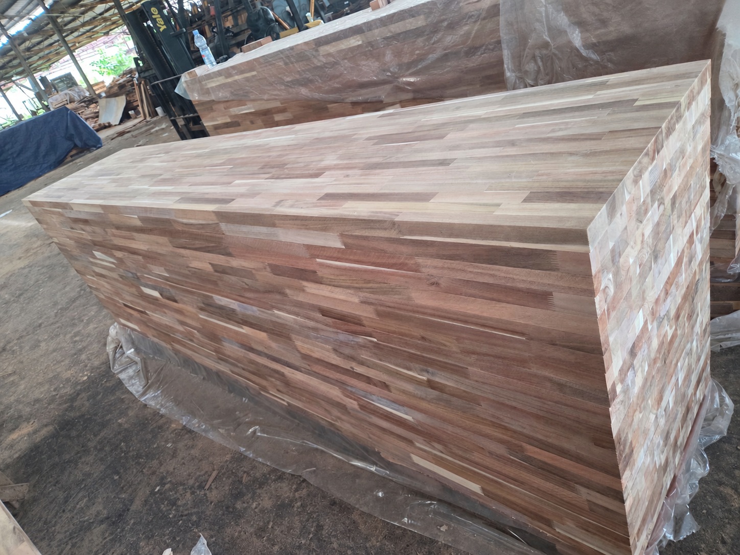 Multiple Acacia butcher block panels viewed from the face and edge
